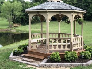 Over the years, the gazebo has served us well with countless picture opportunities at parties, proms, and so on, but with our two children getting married this summer it was time to remodel the gazebo. The original had 56 slats under the banister. That nu