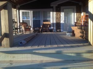 Front porch and deck before TWP Rustic 116 stain.